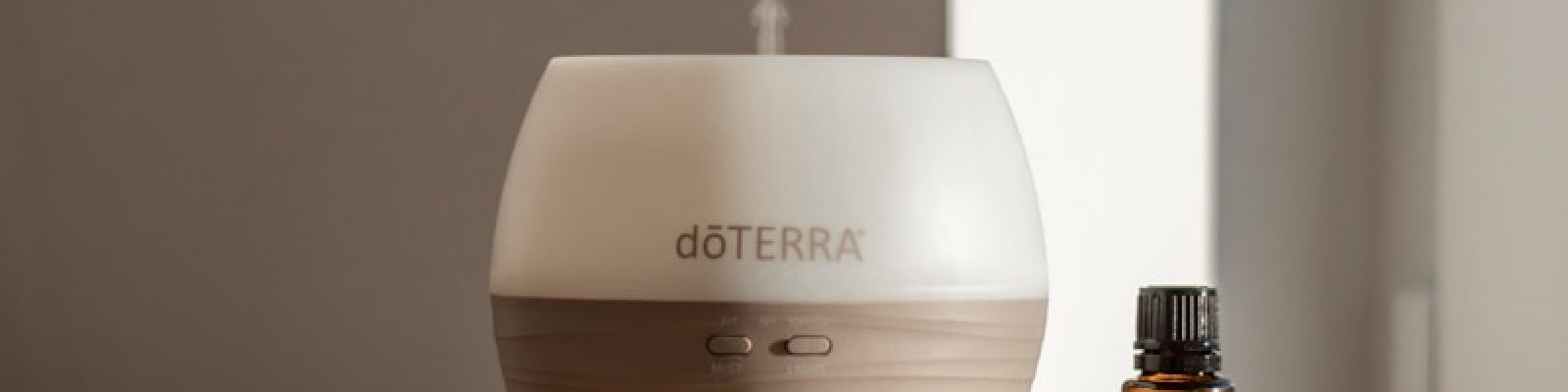 a humidifier sitting on top of a wooden dresser